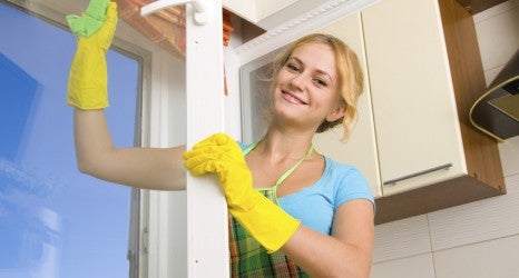 Women cleaning a window 3